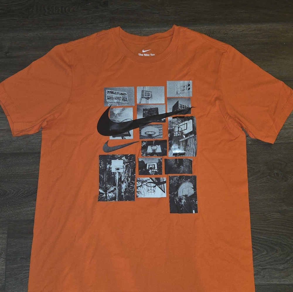 Orange Nike basketball Tee shirt.